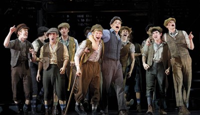 
              FILE - In this theater image released by Disney Theatricals, the cast of The Paper Mill Playhouse Production of "Newsies," starring Jeremy Jordan, center right, is shown in New York. Di
